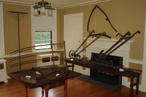 display of antique farm tools